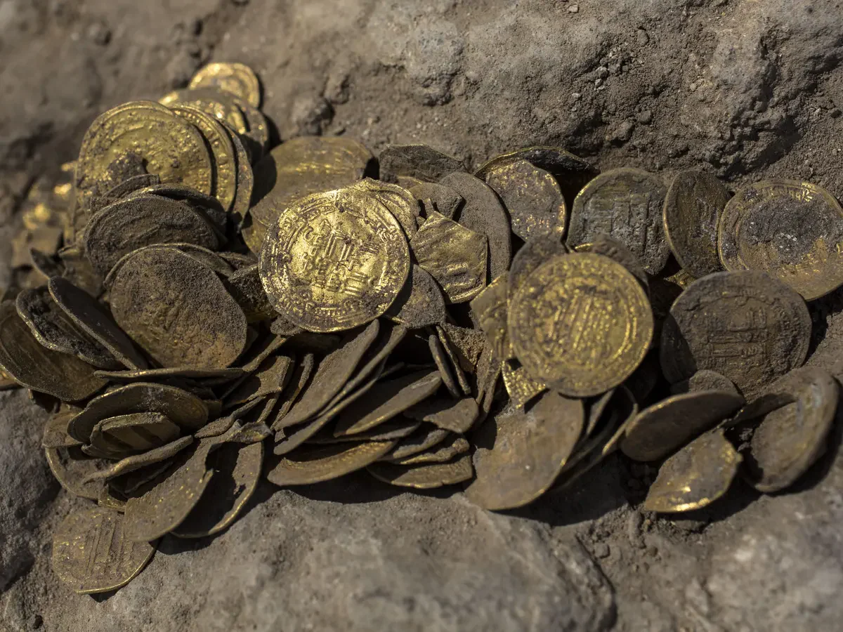 Ancient gold coins unearthed from the soil